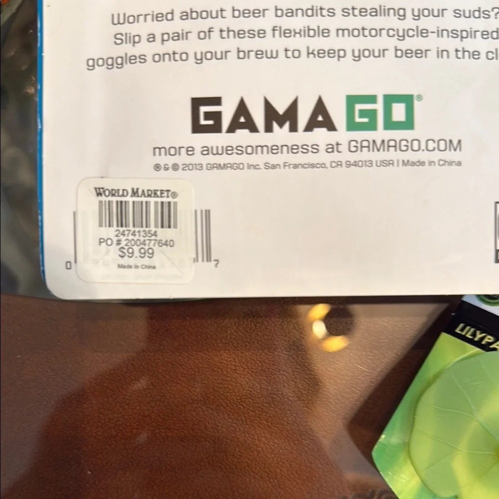 Gama Go Beer Goggles Set with wine glass footwear and lily pad wine stopper.